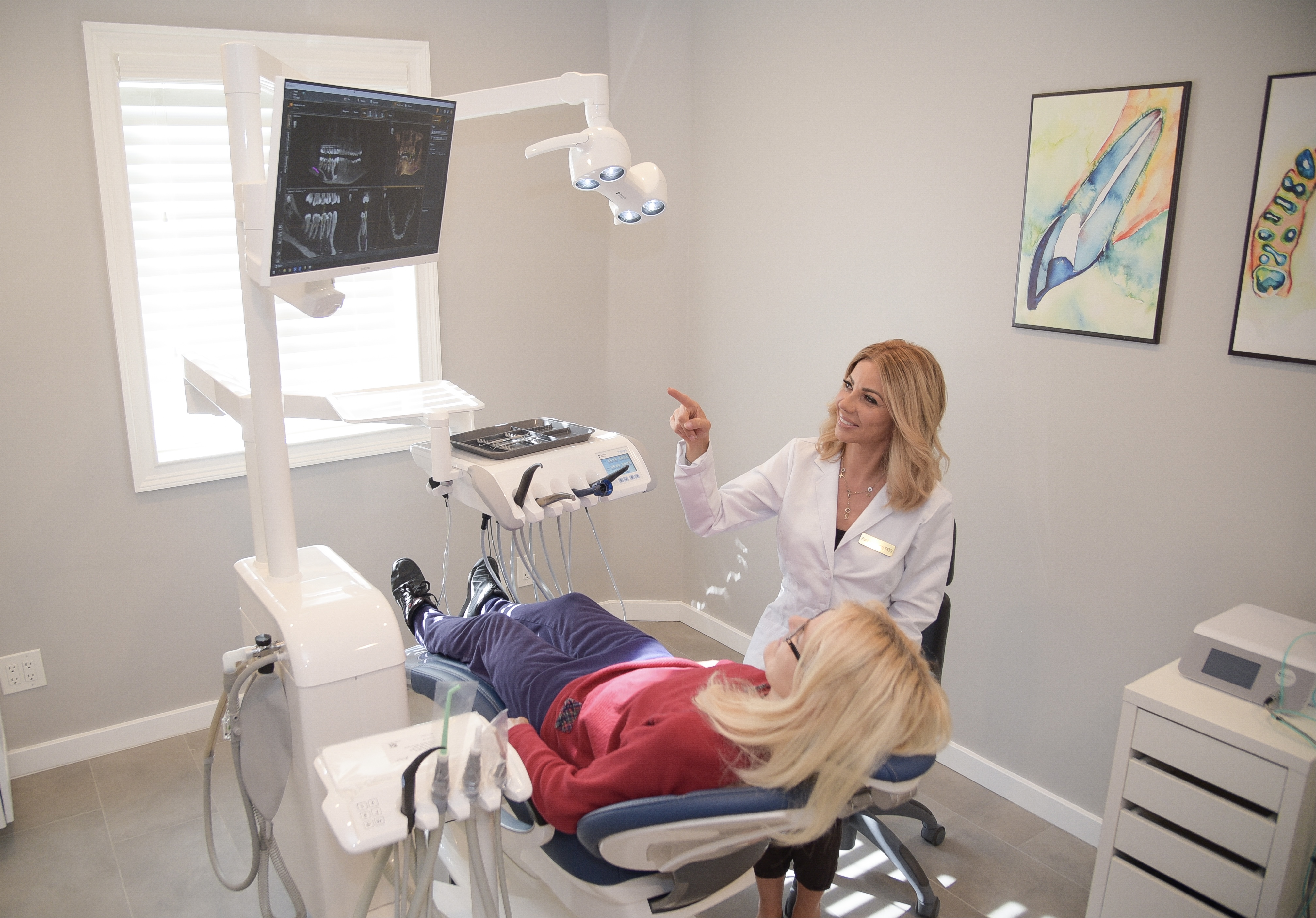 Elite Smiles dentist with patient